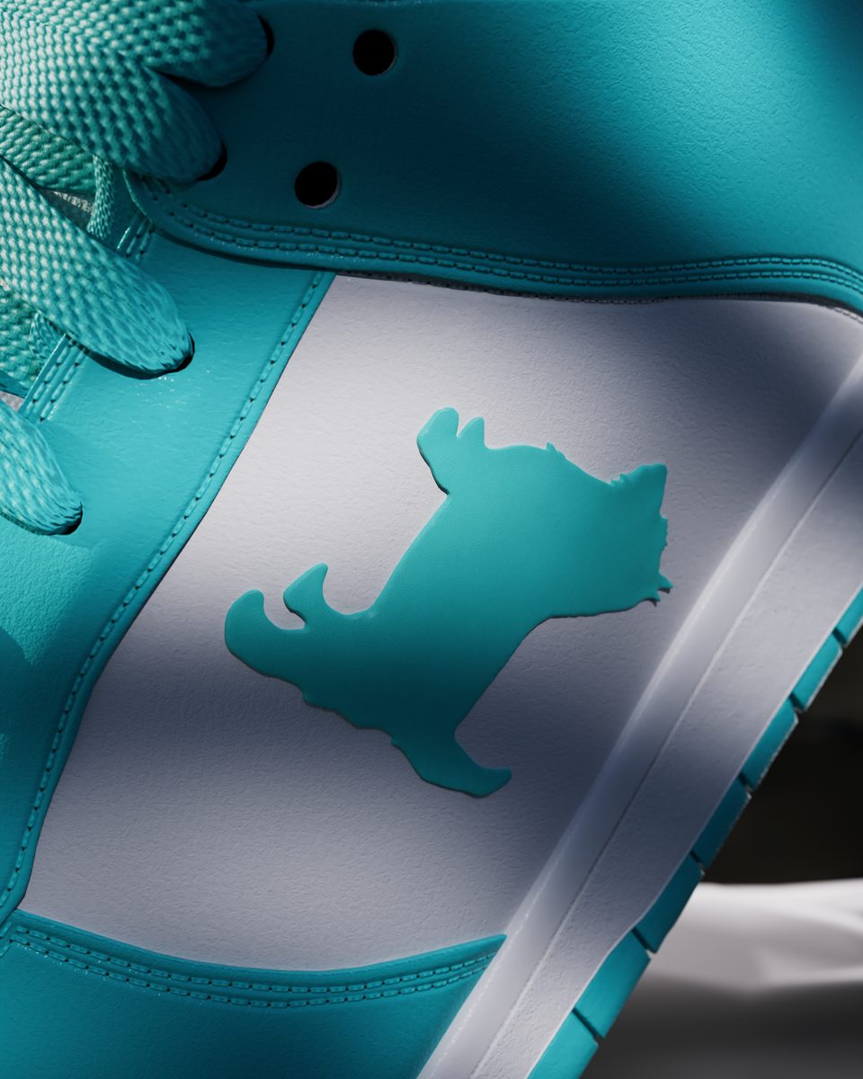 Sneaker turquoise au logo du studio